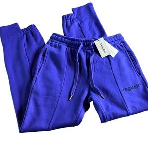 RAGDOLL LOS ANGELES TRACK
PANT IN PURPLE - NWT - Size XS